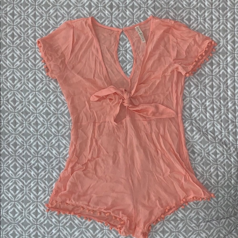 Romper with pin pin edges